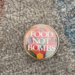 Vintage pin Food Not Bombs Button